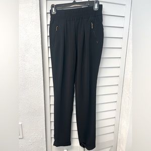 Black professional pants with gold zippers from Zara. XS